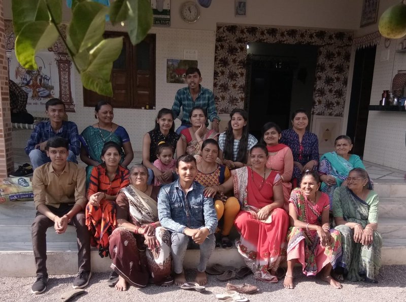 Happy Indian joint family - grandparents, parents and children together